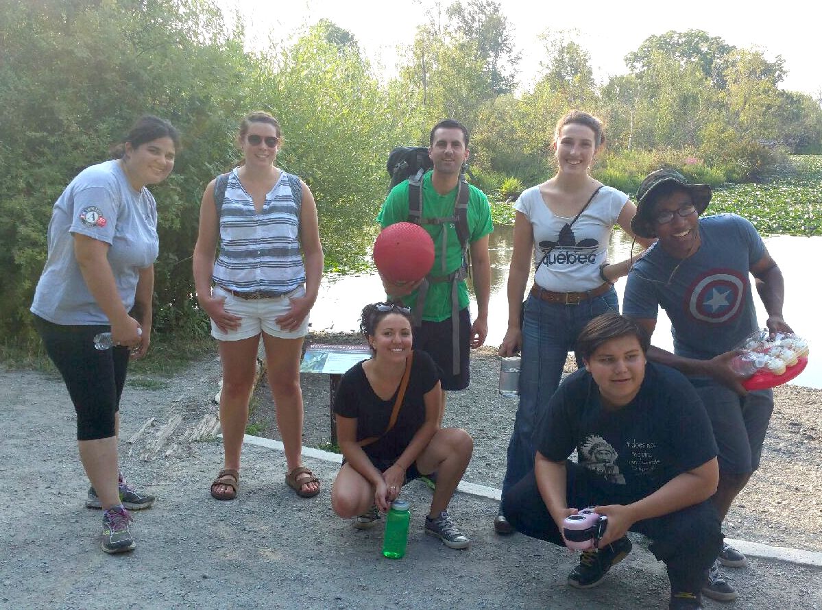 AmeriCorps members, YMCA staff, and participants in the YMCA Member Ambassador Committee pose for a mid-hike photo at Washington Park Arboretum. Pictured left to right: Marja Morgan, Katie Swanson, Parisa Ghebleh, Kevin Hale, Rosie Cullen, Peter Benson, and Samuel Seguido. Photo courtesy Marja Morgan.